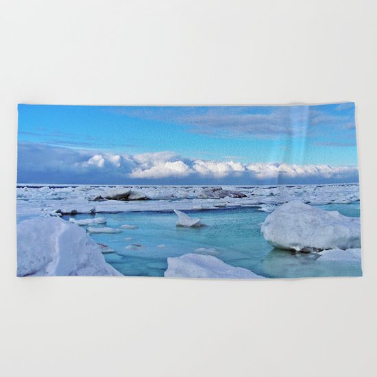 Frozen, and clouds on the Horizon Beach Towel