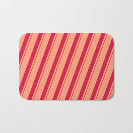 [ Thumbnail: Light Salmon and Crimson Colored Lined Pattern Bath Mat ]