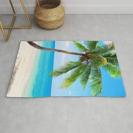 palm tree by the beach Rug