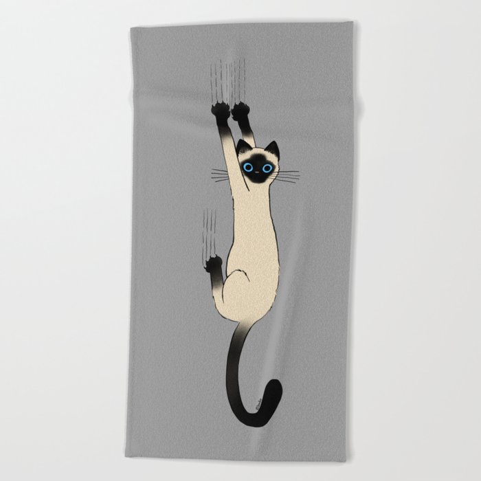 Siamese Cat Hanging On Beach Towel