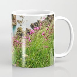 Pink wildflowers on the edge of steep cliffs | Dunnotar Castle, Stonehaven, Scotland Coffee Mug