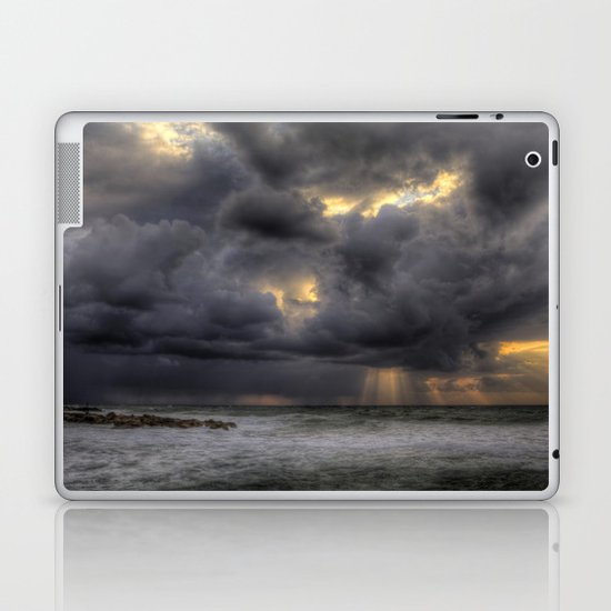 Ray of light through the clouds above the Mediterranean sea, Tel-Aviv, Israel Laptop & iPad Skin