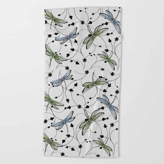 Dragonflies in the garden Beach Towel