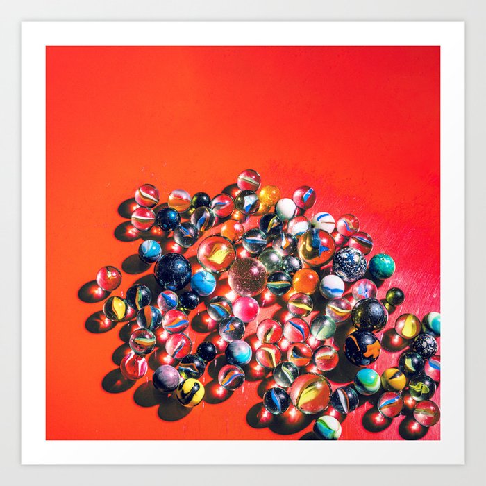 Marbles on vibrant red Art Print