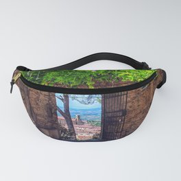 Wisteria covered doorway with view of Tuscany Fanny Pack