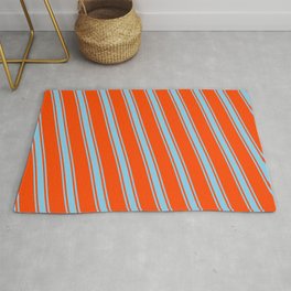 [ Thumbnail: Red and Sky Blue Colored Pattern of Stripes Rug ]