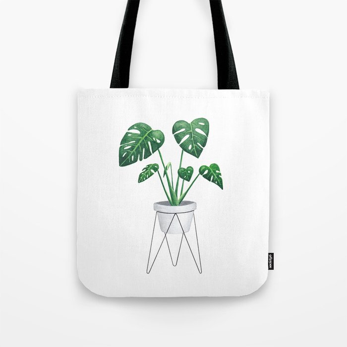 Monstera in designer plant stand with green leaves and foliage Tote Bag