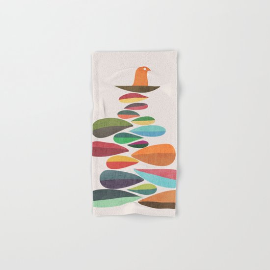 Bird nesting on top of pebbles hill Hand & Bath Towel