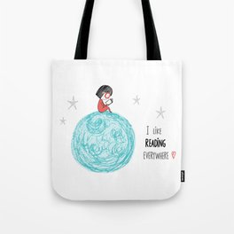 Girl reading in the Moon Tote Bag