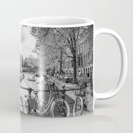 Bicycles parked on bridge over Amsterdam canal Mug