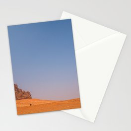 Two lonely hikers in magnificent Wadi Rum desert, Jordan Stationery Card