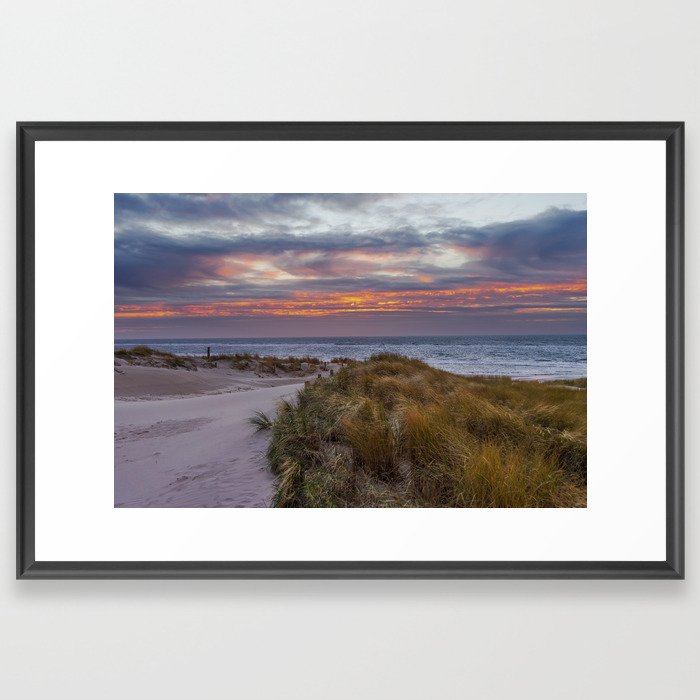 Sunset at the beach from the dunes. Framed Art Print