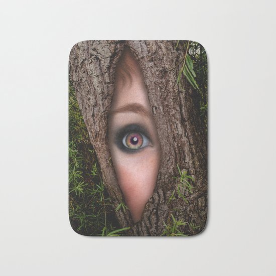 Beautiful Face trapped in a tree trunk Bath Mat