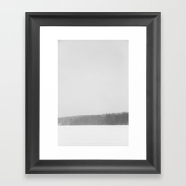 Frozen lake with trees in winter Framed Art Print