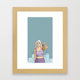 A girl holding a fish Framed Art Print