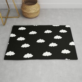 White clouds in black background Rug