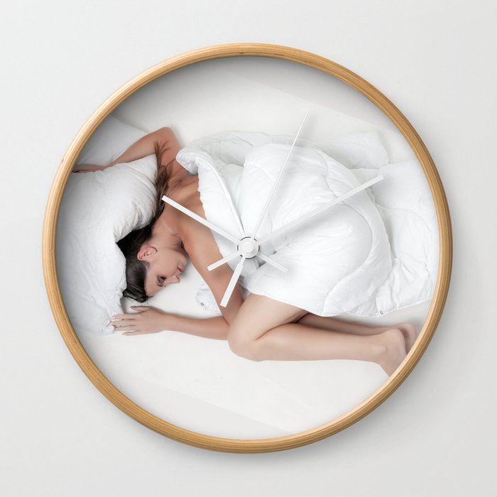 in the bed Wall Clock