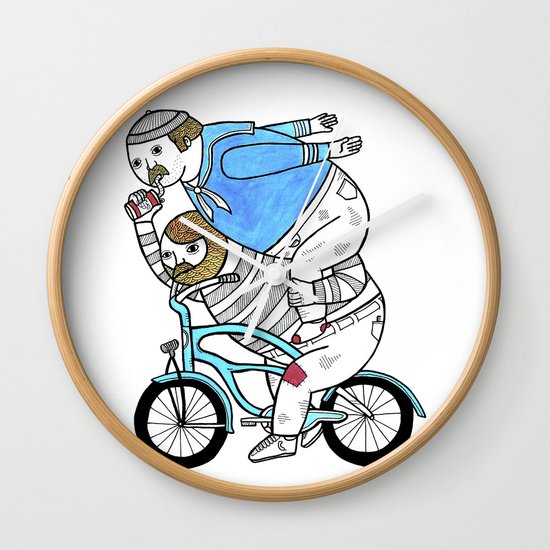 On how bicycle riders utilize team work in certain situations. Wall Clock