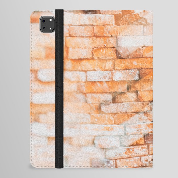 Retro style background or texture in double exposure. The stonewall from old orange bricks.  iPad Folio Case
