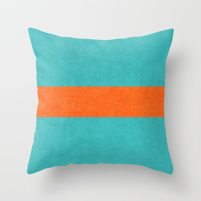aqua and orange pillows