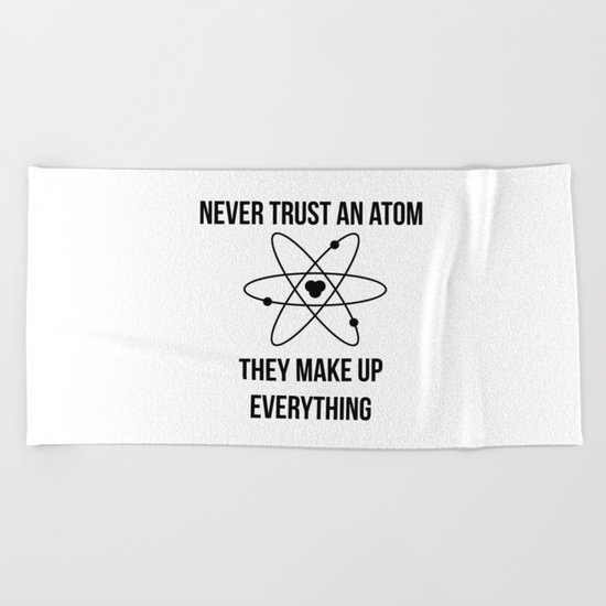 Never trust an atom. They make up everything Beach Towel
