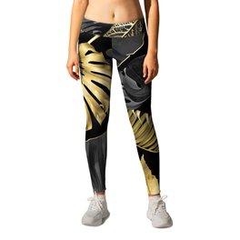 Abstract pattern with gold and black tropical leaves on dark background. Exotic botanical design, hawaiian style, luxury, golden, sparkle, glitter background Leggings