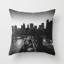Brooklyn Bridge and Manhattan skyline at night in New York City black and white Throw Pillow
