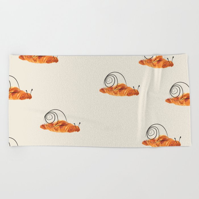 croissant snail Beach Towel