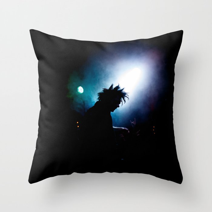 silhouette of a punk rock artist in the spotlight Throw Pillow