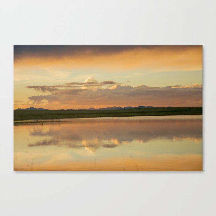 Sunset at the town Canvas Print