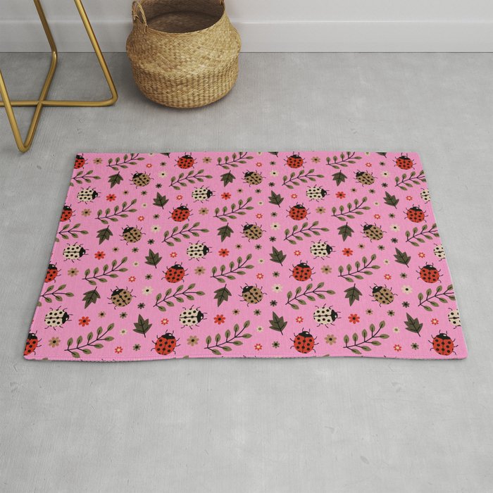 Ladybug and Floral Seamless Pattern on Pink Background Rug