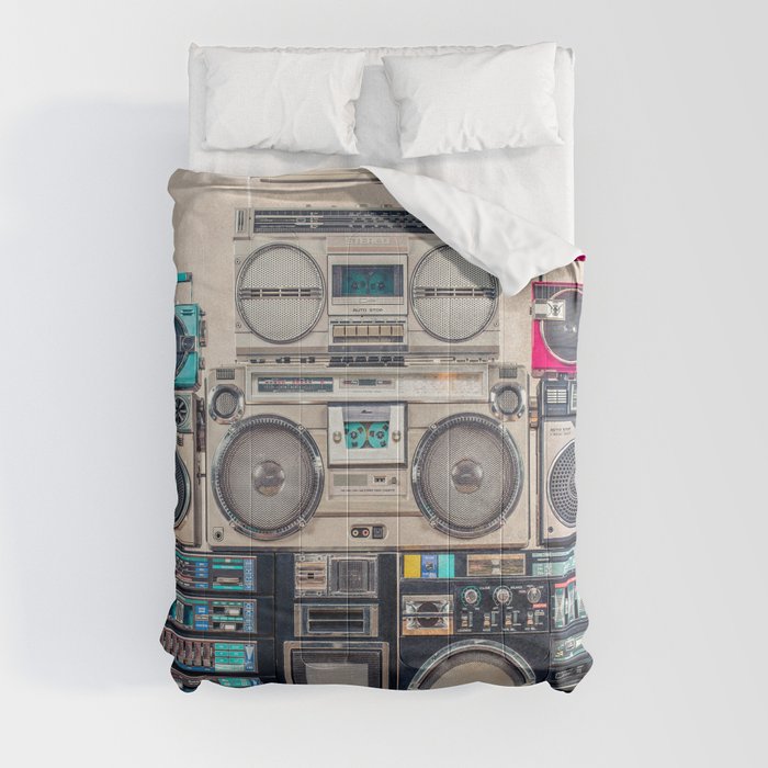 Retro old school design ghetto blaster stereo radio cassette tape recorders  boombox tower from circa 1980s front concrete wall background. Vintage  style filtered photo Comforter by Elegant Decor