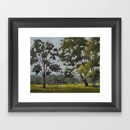 cows through the trees Framed Art Print