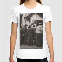 GRAYSCALE PHOTOGRAPHY OF MEN STANDING NEAR HOUSE T-shirt