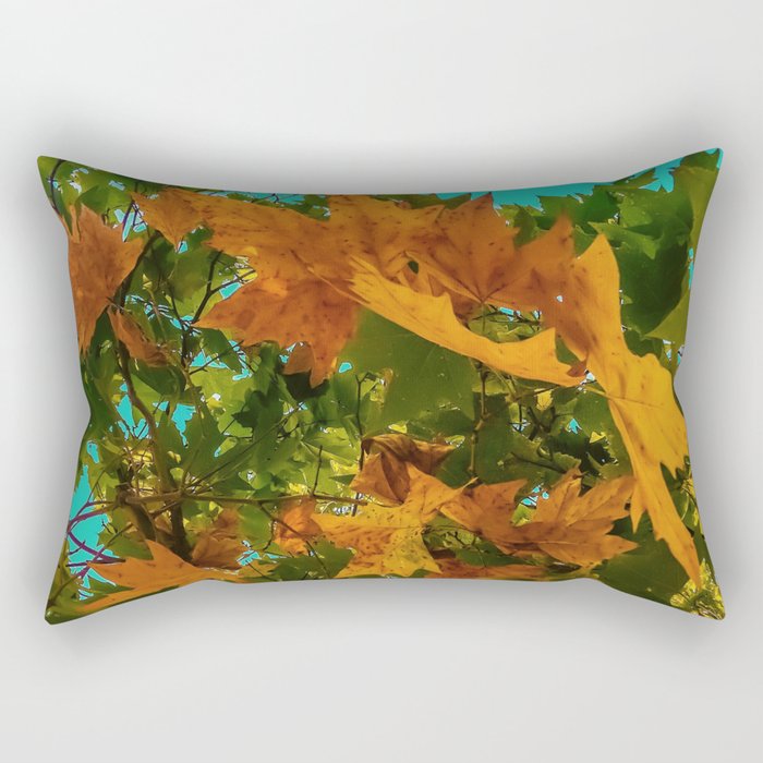 Maple tree branch with orange and green autumn leaves and blue sky Rectangular Pillow