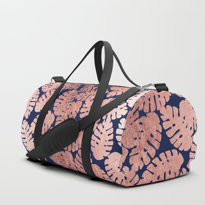 navy and rose gold bag