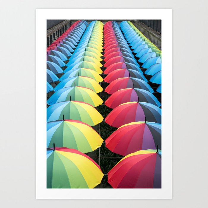Rows of rainbow color umbrellas. Art Print