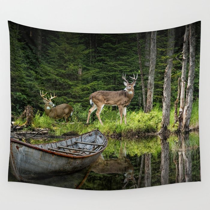 Whitetail Deer at the Edge of a Forest Pond by a Hunting Camp with Canoe Wall Tapestry