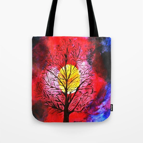 Sunset behind the tree Tote Bag