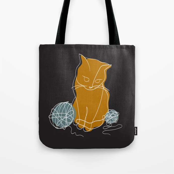 Cat with yarn white line art on black Tote Bag