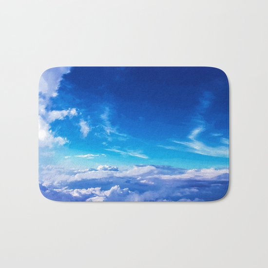 Above the clouds sky is always blue Bath Mat