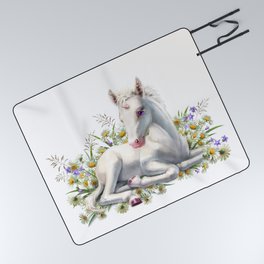 Baby unicorn lies in flowers Picnic Blanket