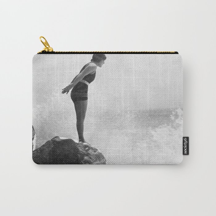 Female swimmer on rock above crashing surf Carry-All Pouch