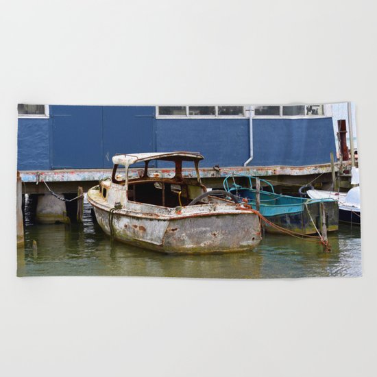 Still afloat Beach Towel