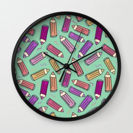 Scattered color pencils - mint green background Wall Clock