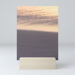 Purple glow on an early morning sandy beach Mini Art Print