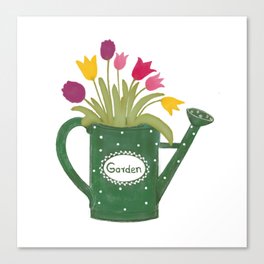 Green watering can with colorful spring bouquet Canvas Print