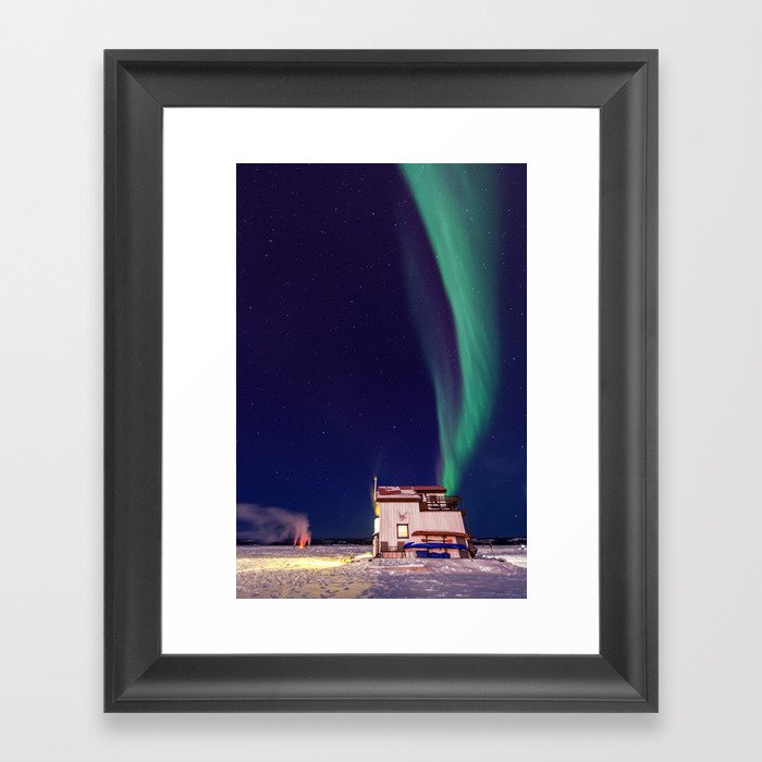 Northern Lights and house boat in Yellowknife Framed Art Print