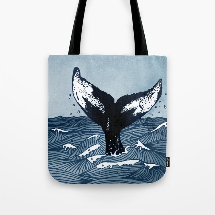 Hump Back Whale tail breaking the surface of stormy waves at sea Tote Bag