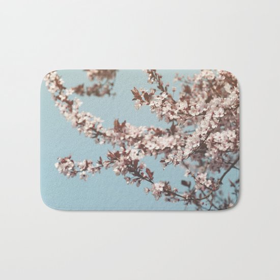 Cherryblossoms against the blue sky Bath Mat